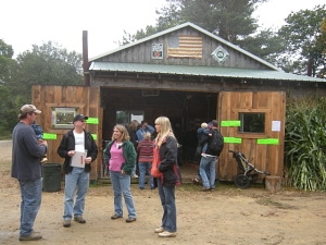 Friends gathering in front of the sugar shack.